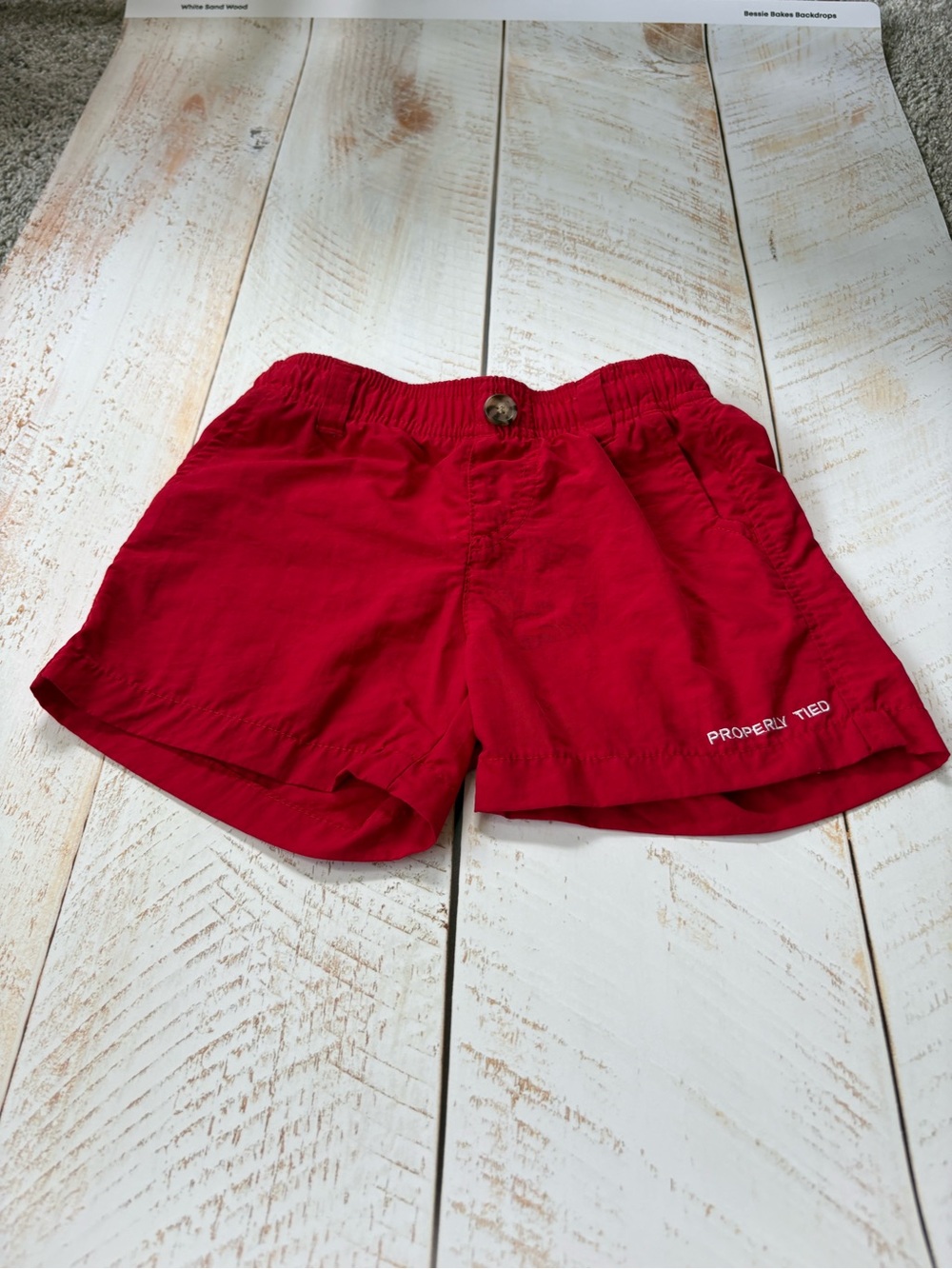 Properly tide boys shorts.